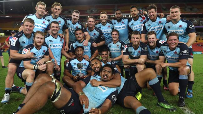 NSW celebrate winning the Super Rugby game between the Queensland Reds and the NSW Waratahs. Pic Darren England.