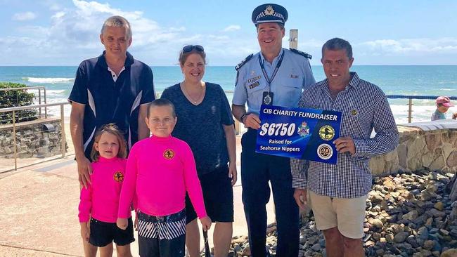 The Bloor family with Sunshine Coast Superintendent Darryl Johnson at a charity fundraiser for Seahorse Nippers, Alexandra Headland. Picture: Rob Elphinstone