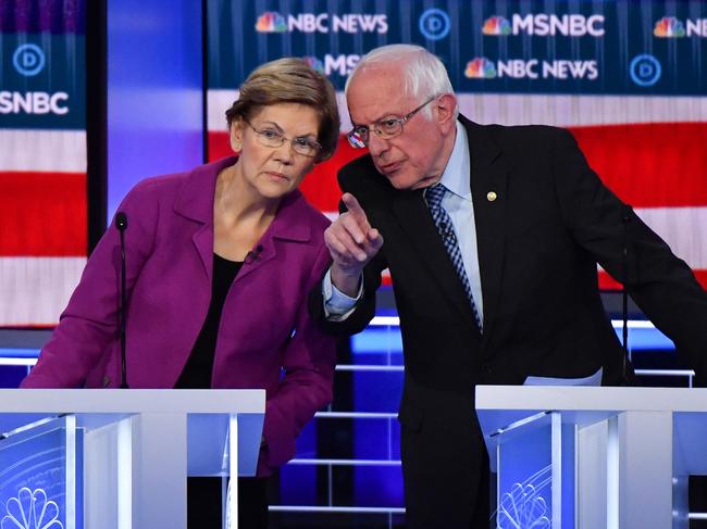 Democratic presidential hopefuls Elizabeth Warren and Bernie Sanders. Ms Warren targeted Mike Bloomberg during the debate. Picture: AFP