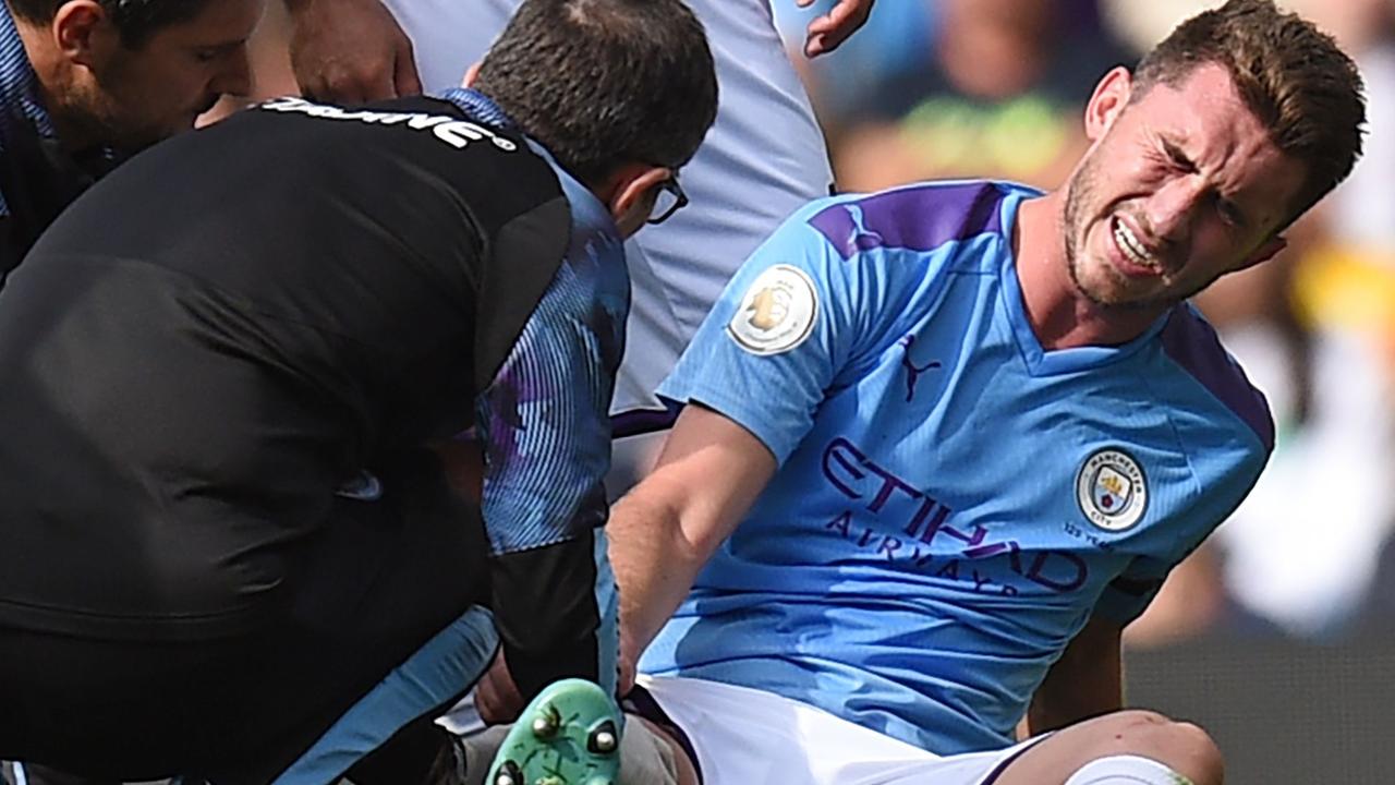 Aymeric Laporte will be out for around six months with a knee injury.