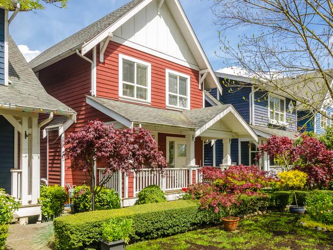 North Burnaby homes, British Columbia, Canada with beautiful North Shore mountains in the background.