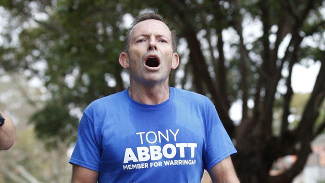 Tony Abbott catching his breath after running 10km. Picture: David Swift