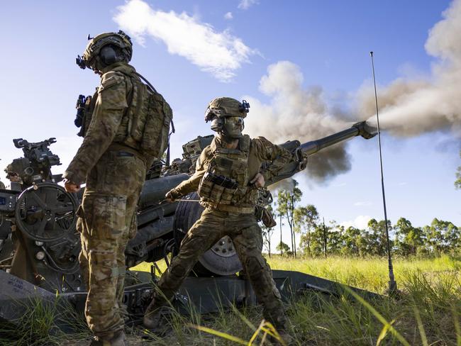 Australian Army soldiers from 4th Regiment, Royal Australian Artillery, fire a M777 howitzer at Townsville field training area, Queensland. *** Local Caption *** The Australian Armys 3rd Brigade deployed to the Townsville field training area to conduct Exercise Brolga Walk. The exercise encompassed all direct command units of 3rd Brigade, with a focus on honing core skills as personnel prepared for Exercise Brolga Run, the major training activity later in the year. A mixture of armoured, artillery, engineering, infantry, logistics, command and control activities allowed units to develop their skills. Notably, a small contingent from the Papua New Guinea Defence Force also deployed to participate in the exercise. PHOTO: TPR Dana Millington