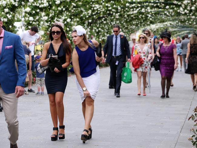 Melbourne Cup Day 2014 at Flemington Racecourse. Punters make their way to the track. Picture: Mark Stewart