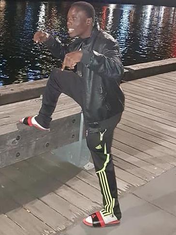 Missing athlete, Simplice Fotsala, a 29-year-old boxer from Cameroon, poses in a series of photos posted on his Facebook page. Picture: Facebook.