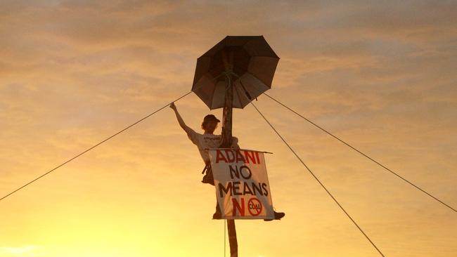 An activist protests against the Bravus Mine near Belyando Crossing.