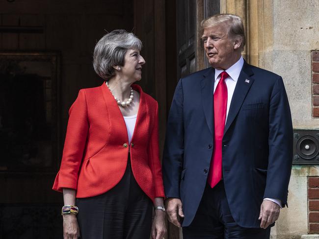 AYLESBURY, ENGLAND - JULY 13: British Prime Minister Theresa May greets U.S. President Donald Trump at Chequers on July 13, 2018 in Aylesbury, England. US President, Donald Trump, held bi-lateral talks with British Prime Minister, Theresa May at her grace-and-favour country residence, Chequers. Earlier British newspaper, The Sun, revealed criticisms of Theresa May and her Brexit policy made by President Trump in an exclusive interview.  (Photo by Dan Kitwood/Getty Images)