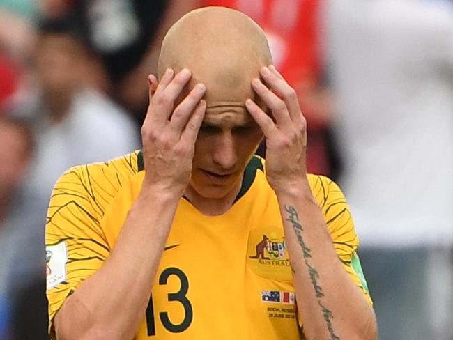 Australia's Aaron Mooy reacts after Peru score their 2nd goal during their final FIFA World Cup group match at Fisht Stadium during the FIFA 2018 World Cup in Sochi, Russia, Tuesday, June 26, 2018. (AAP Image/Dean Lewins) NO ARCHIVING