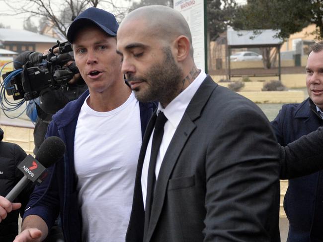 Disgraced investment banker Oliver Curtis (left) stayed silent as he left Cooma jail this morning and boarded a private jet. Picture: Jeremy Piper