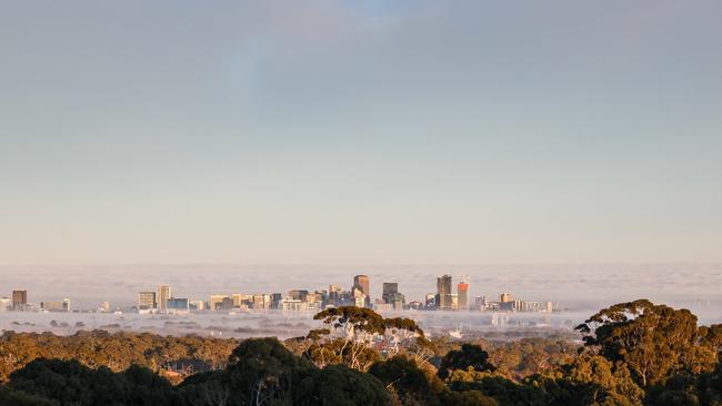 Thick fog over the city and suburbs photographed from Skye Pictures/Russell Millard