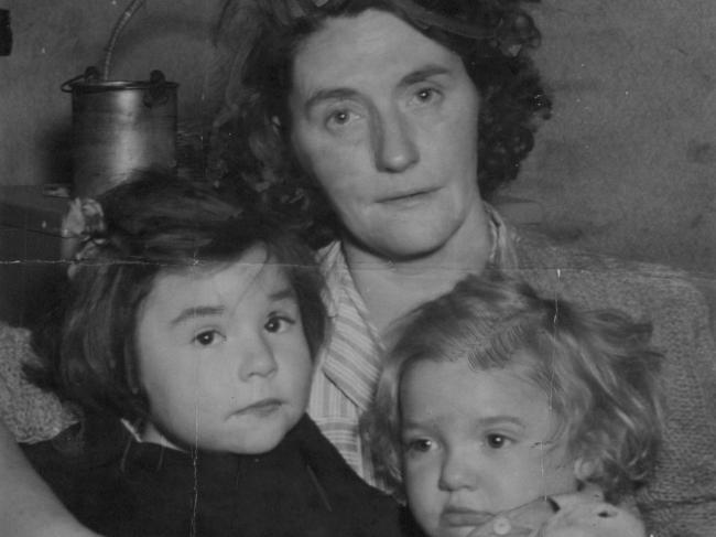 Joan’s mother, Elizabeth Norris, with her younger children, Iris and Ellen.