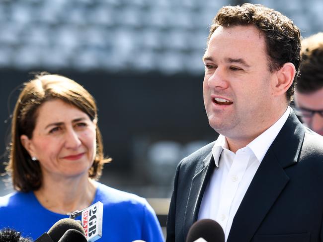 NSW Minister for Sport Stuart Ayres speaks to the media alongside Premier Gladys Berejiklian during a press conference at Ken Rosewall Arena in Sydney, Friday, January 4, 2018. The Premier announced a $50 million overhaul of the Ken Rosewall Arena located in Sydney's Olympic Park. (AAP Image/Paul Braven) NO ARCHIVING