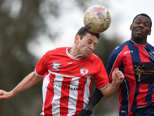 James Lazorov wins a header for Plenty Valley Lions. Picture: David Smith