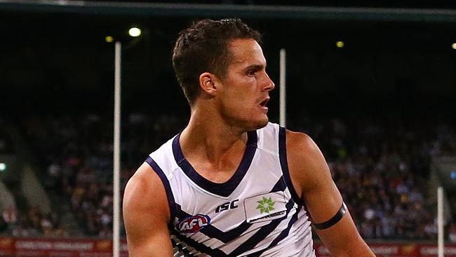 PERTH, AUSTRALIA - APRIL 29: Harley Balic of the Dockers sidesteps Sharrod Wellingham of the Eagles during the round six AFL match between the West Coast Eagles and the Fremantle Dockers at Domain Stadium on April 29, 2017 in Perth, Australia.  (Photo by Paul Kane/Getty Images)