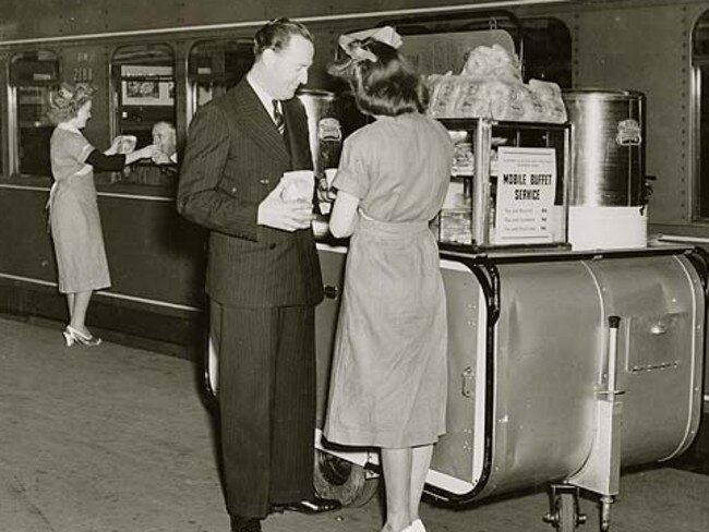 A mobile tea and light refreshment buffet was introduced on to the steam platforms at Central in 1948. Buffet dining cars were inaugurated in 1950 when they were added to the new eight car Riverina Expresses Picture: NSW State Archives