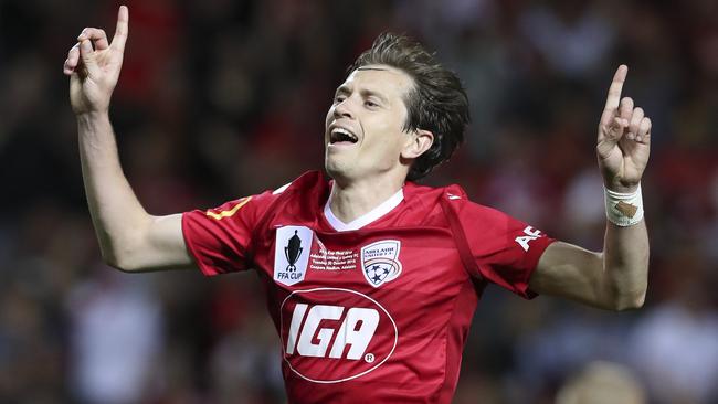 Adelaide United winger Craig Goodwin celebrates his brace during last season’s FFA Cup final win over Sydney FC. Picture: Sarah Reed