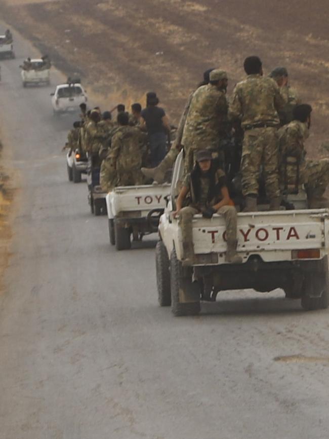 A convoy of Turkish backed Free Syria Army is near the border town of Azaz. Picture: AP.