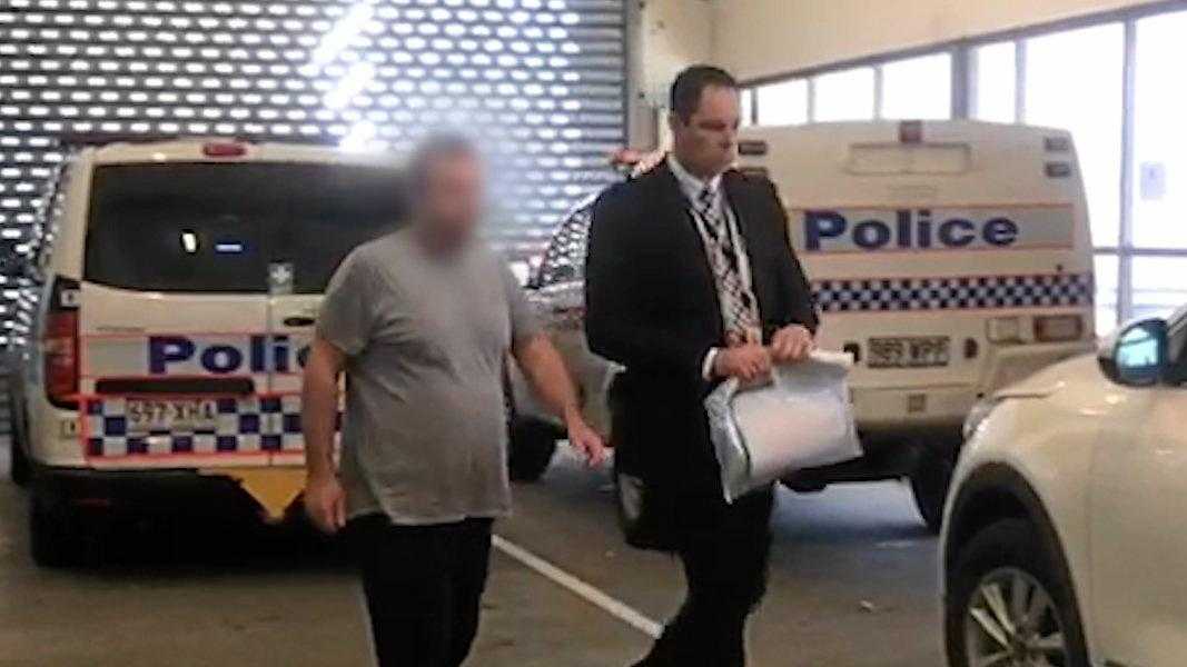 The man being escorted to Tweed Heads Police Station. Picture: NSW Police