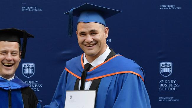 Former bad boy and new Tigers forward Russell Packer graduating from UOW with a commerce degree.