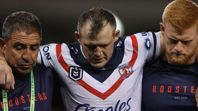 Brett Morris comes off with an ACL injury (Photo by Ashley Feder/Getty Images)