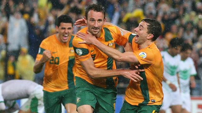 Josh Kennedy of the Socceroos celebrates heading the ball to score a goal during the FIFA 2014 World Cup Asian Qualifier match in June last year.