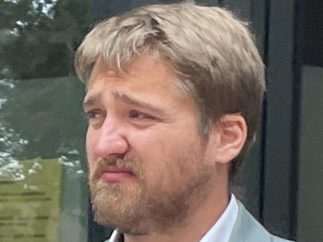 A German tourist who no longer has the right to stay in Australia will have to wait six more weeks to learn his fate for killing a motorbike rider in a tragic crash in Sydneyâs south. Jozsef Buglyo, 29, (right) sobbed throughout his Sutherland Local Court appearance where he pleaded guilty to negligent driving causing death. Pictured with his girlfriend. Picture: Ashleigh Tullis