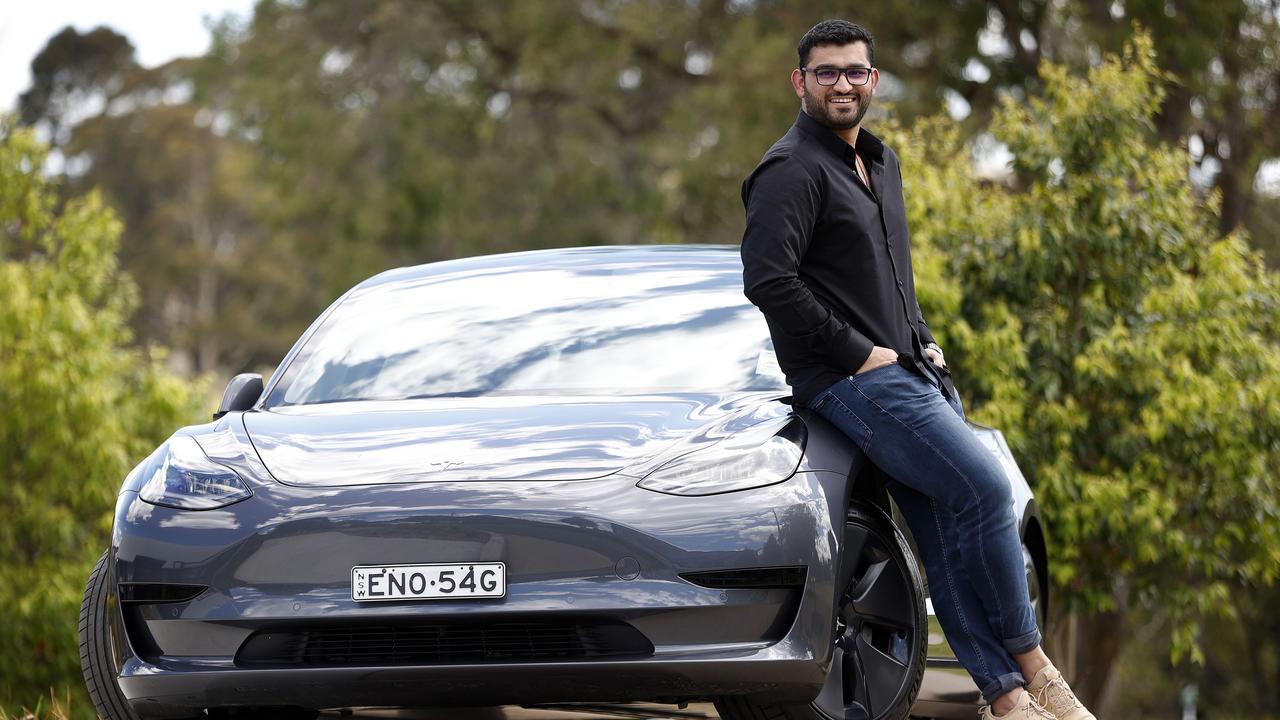 Daksh Juneja pictured with his Tesla that he rents out on new car share app Turo. Picture: Sam Ruttyn