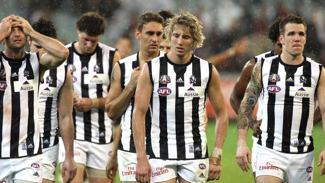  Essendon v Collingwood. MCG. 2009 Anzac Day. Shane O'Bree, Dale Thomas and Dane Swan post game. 