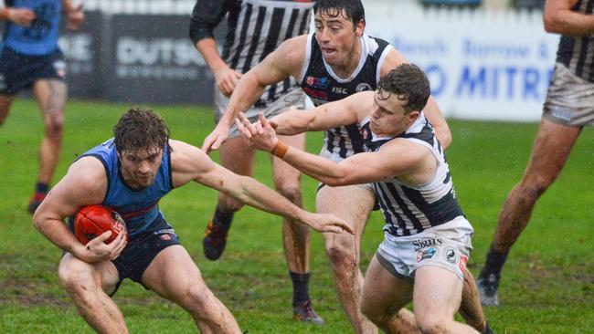 Sturt's Josh Hone looks for an escape route against Port Adelaide. Picture: AAP/Brenton Edwards