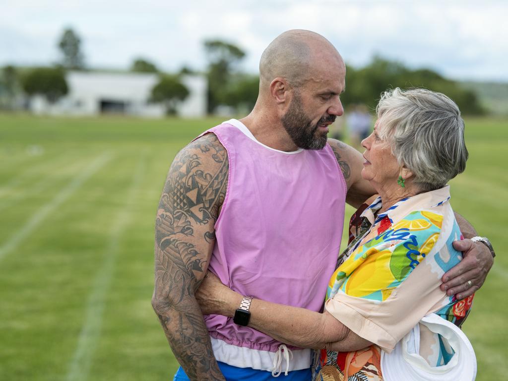 Grant McDonald and his mother Joan McDonald embrace after Grant competed in the Pittsworth leg of the race named in memory of his father, John “Cracker” McDonald AM. Picture: Nev Madsen.