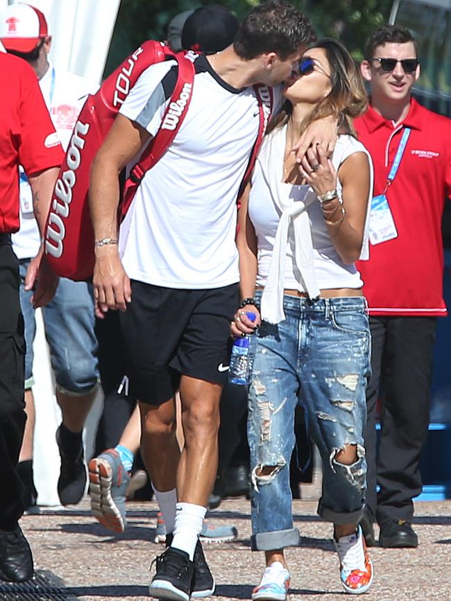 Grigor Dimitrov and Nicole Scherzinger share a smooch at the Brisbane International.