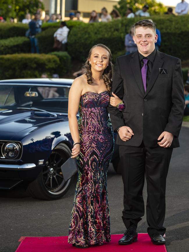 Mia Barton and Deakin Gainey arrives at Harristown State High School formal at Highfields Cultural Centre, Friday, November 18, 2022. Picture: Kevin Farmer