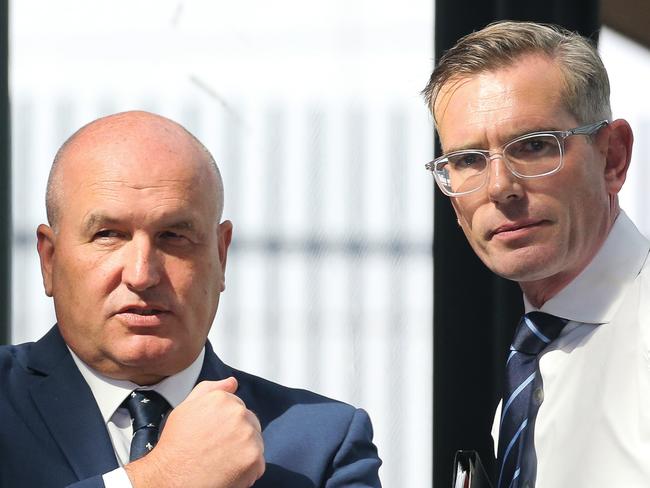 SYDNEY, AUSTRALIA - Newswire Photos MARCH 01 2023:  Minister for Transport David Elliott and The Premier Dominic Perrottet are seen chatting at Tullawong Railway Station ahead of a press conference in Sydney. Picture: NCA Newswire/ Gaye Gerard