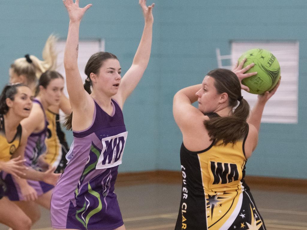 Action from regonal netball open semi-final between Lower Clarence and Grafton at Grafton Sports Centre.