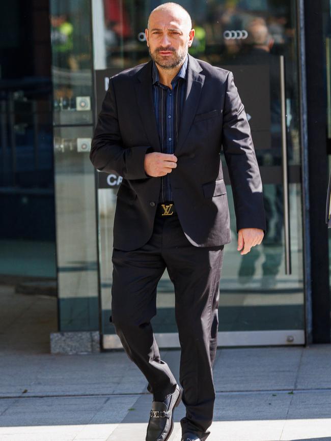 The Federal Court heard about $100m in accounts linked with Robert Filippini (leaving court in September) have been frozen. Picture: Nadir Kinani