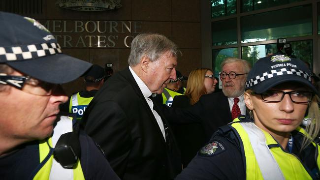 MELBOURNE, AUSTRALIA - MAY 01:  Cardinal George Pell (L) arrives with his defending lawyer Robert Richter QC at Melbourne Magistrates' Court on May 1, 2018 in Melbourne, Australia. Cardinal Pell was charged on summons by Victoria Police on 29 June 2017 over multiple allegations of sexual assault. Cardinal Pell is Australia's highest ranking Catholic and the third most senior Catholic at the Vatican, where he was responsible for the church's finances. Cardinal Pell has leave from his Vatican position while he defends the charges.  (Photo by Michael Dodge/Getty Images)