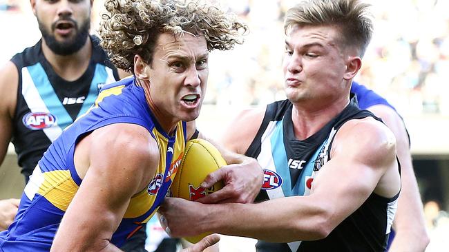 West Coast Eagles’ Matt Priddis breaks past Port Adelaide’s Ollie Wines. Picture: SARAH REED