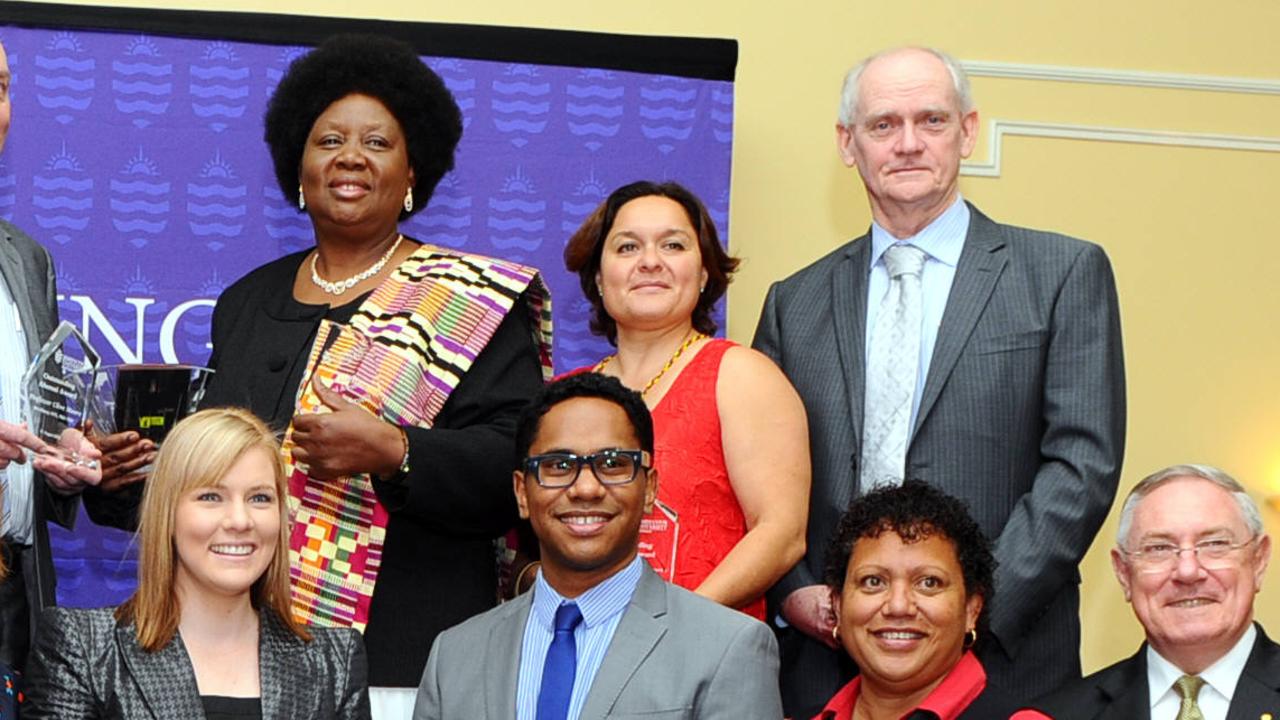 Prof Ngiare Brown (back row, in red) at the 2012 JCU Outstanding Alumni Awards Breakfast at Southbank.