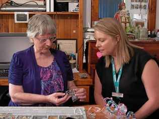 HOME HELP PRICELESS: Margaret Lee shows Rebecca Elks jewellery she created at a speciality table thanks to her home care package. Picture: The Whiddon Group