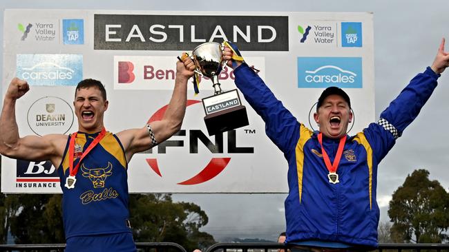 Noble Park captain Kyle Martin and coach Steve Hughes celebrate after winning the EFL Premier Division premiership. Picture: Andy Brownbill