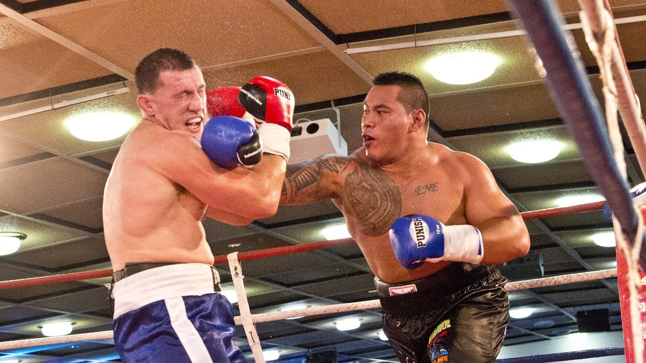 Paul Gallen (left) and Hermann Ene-Purcell fight it out in Toowoomba. Friday, Jan 29, 2016.