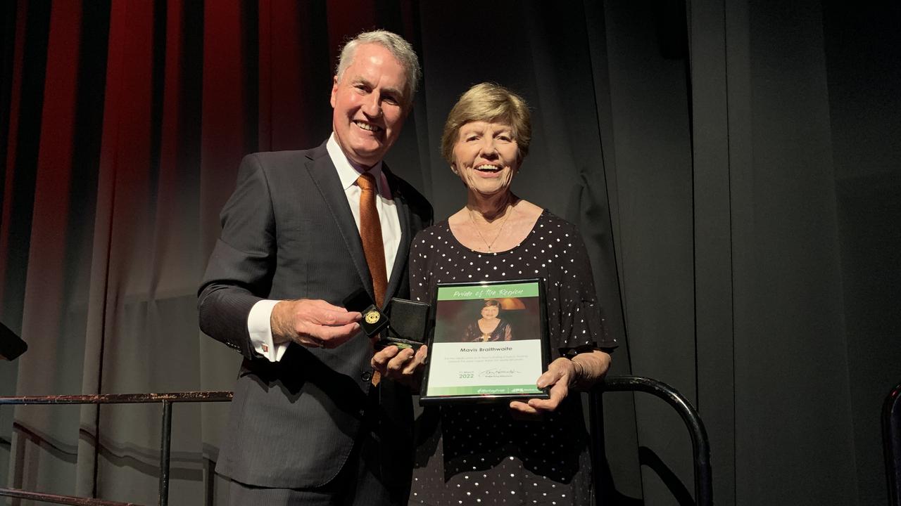 St Paul's Uniting Church organist Mavis Braithwaite receives the Pride of the Region award from Mackay Mayor Greg Williamson at the MECC on March 11. Picture: Duncan Evans