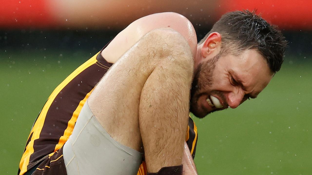 Jack Gunston was in immediate pain after hurting his right ankle against Collingwood. Picture: Getty Images