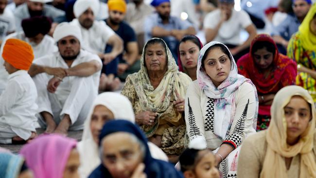 A prayer ceremony was held for bus attack victim Manmeet Sharma at the Brisbane Sikh Temple on Saturday. Pic: Tara Croser