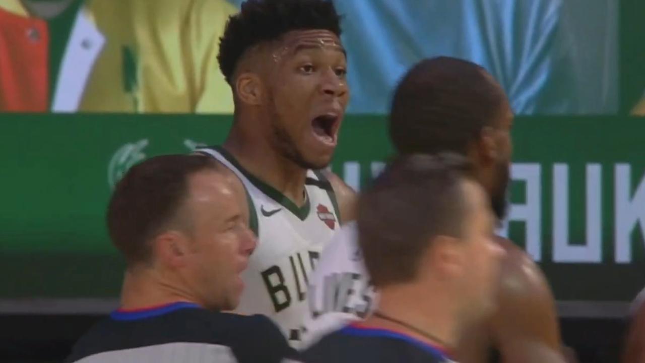 Giannis Antetokounmpo had to be held back after hitting the deck.