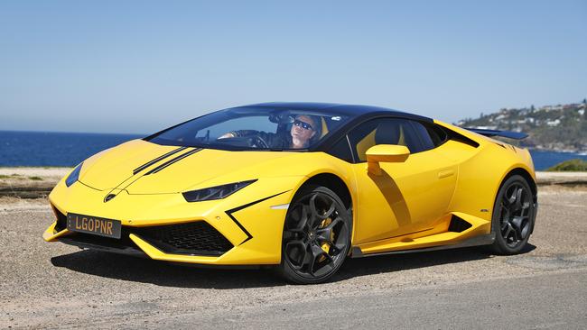 Barrister Peter Lavac – pictured at Palm Beach with his Lamborghini with rego plates "LGOPNR" – made international headlines after refusing to change his plates. Picture: Sam Ruttyn