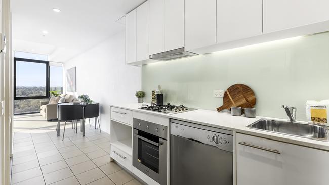 The apartment sits on the 20th floor and is just steps from Royal Park and Melbourne Zoo.