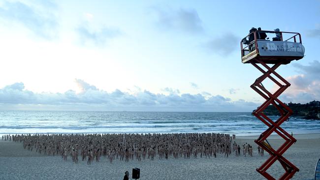 Sydney-siders strip bare naked at Bondi Beach for a Spencer Tunick photograph to raise awareness on the importance of early detection for skin cancer. Picture: Jeremy Piper