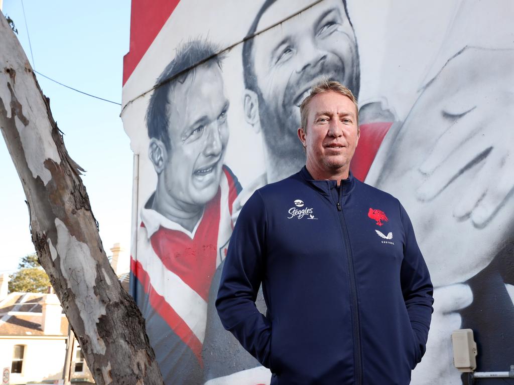 Trent Robinson pictured in front of a club legends mural at Bondi Junction which now includes retiring Sydney Roosters co-captains Jake Friend and Boyd Cordner. Picture: Richard Dobson