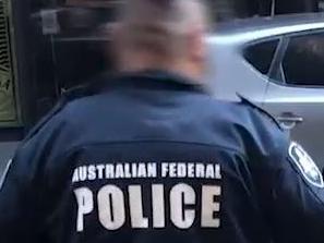 AFP OPERATION IRONSIDE PHASE II, Vison of the arrest of a 38 year-old man and ammunition seized in Barrangaroo., Picture: Supplied Australian Federal Police(AFP), The Australian Federal Police, NSW Police Force and Australian Border Force in Sydney to announce the first wave of results as part of Operation Ironside Phase II in NSW., , , The Australian Federal Police, NSW Police Force and Australian Border Force will address media in Sydney on Friday (17 December 2021) to announce the first wave of results as part of Operation Ironside Phase II in NSW., ,  Eight men are expected to face court following the targeted police activity that resulted in the seizure of encrypted devices, cocaine, cash, firearms and ammunition.